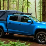 쉐보레 콜로라도의 적재함 활용 팁 - **Prompt: Serene Morning Car Camping in Chevrolet Colorado**
    
    A wide shot of a Chevrolet Col...